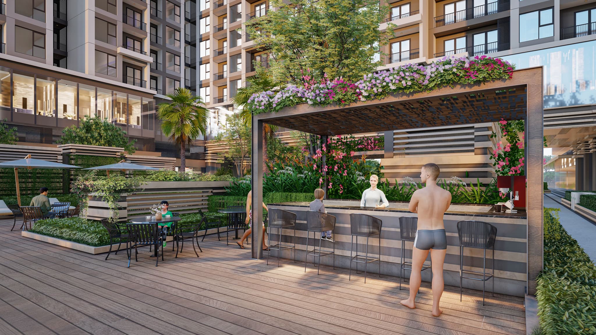 Modern outdoor bar scene with seating, greenery, and residents enjoying the vibrant atmosphere of an urban complex.